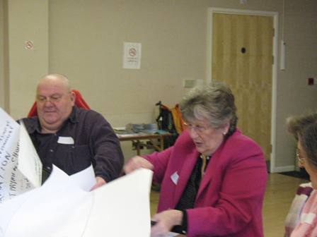 Councillor Brierly writing on flipchart what people were saying